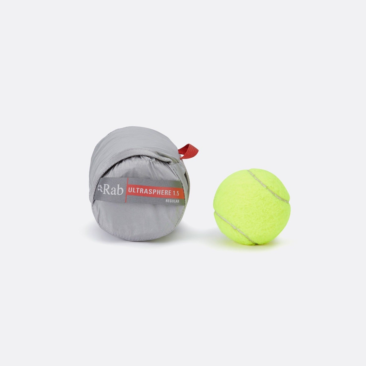 Rab Ultrasphere 1.5 Sleep Mat packed in its stuff sack next to a tennis ball